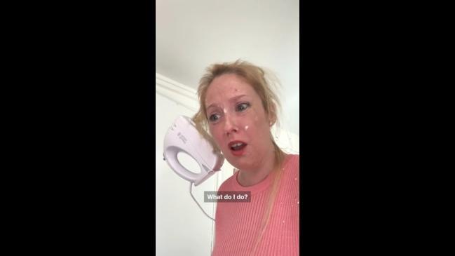 Mum gets hair caught in electric whisk