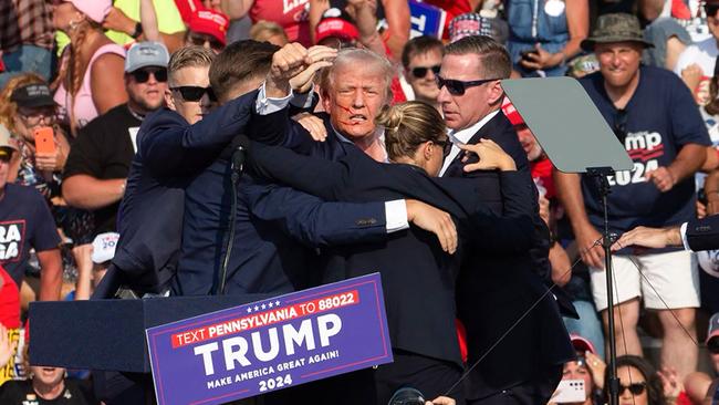 The former president said it was a “miracle” he turned his head a split second before Thomas Crooks opened fire at his Pennsylvania rally and struck his ear. Picture: Rebecca Droke / AFP