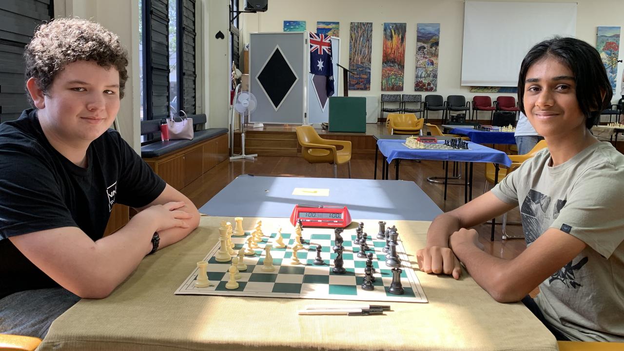 Owen Franettovich (left) and Hunsveer Chohan play a warm-up game at the Mackay Chess Open on May 14. Picture: Duncan Evans