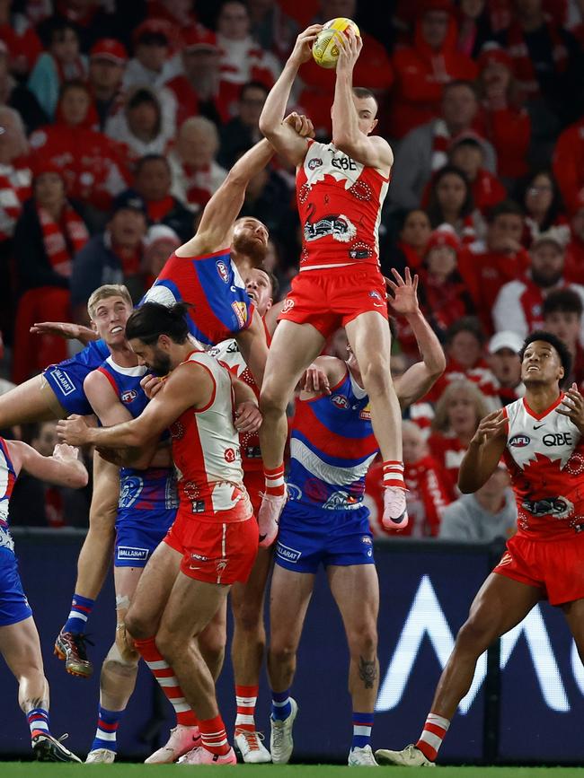 Warner flies for a mark before kicking his third goal. (Photo by Michael Willson/AFL Photos via Getty Images)