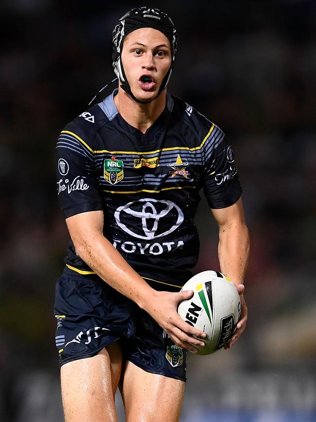 Kalyn Ponga kicks for the Cowboys.