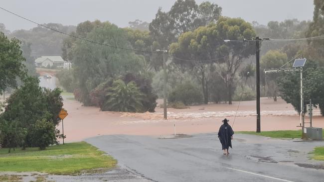 Floodwaters rage in Wedderburn. Picture: Facebook