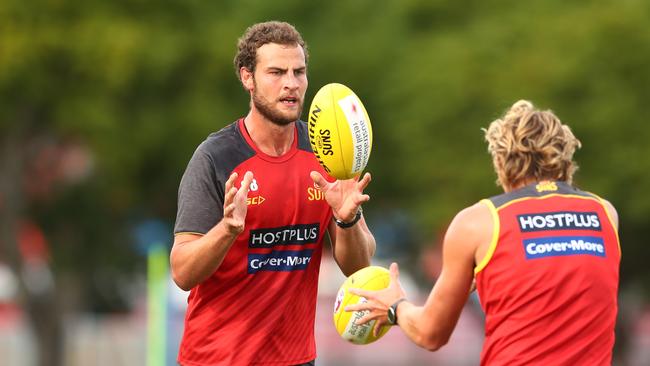 Jarrod Witts handballs during a Gold Coast Suns AFL training session at Metricon Stadium on May 22, 2020 in Gold Coast, Australia. (Photo by Chris Hyde/Getty Images)