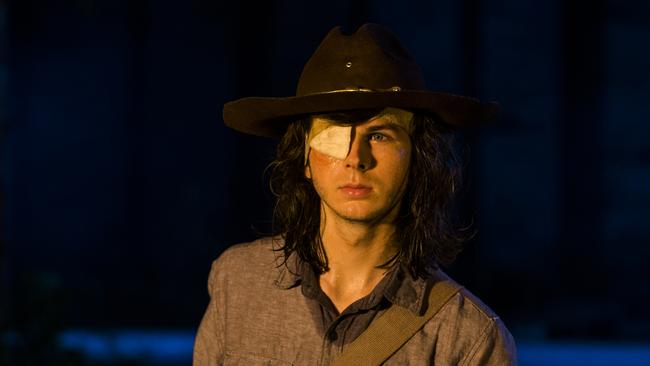 Did Carl really get bitten? He didn’t react during the fight scene, nor complain afterwards.