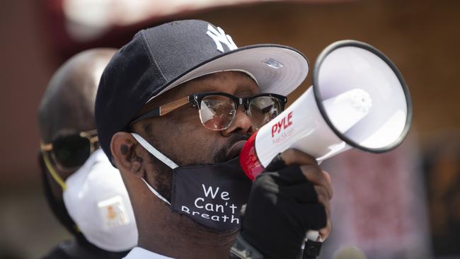 Terrence Floyd speaks to a group gathered at the site where his brother George Floyd was killed by police one week ago. Picture: AFP