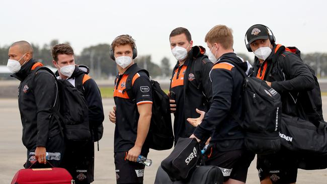 The Tigers gather at Sydney Airport to leave for Queensland on Wednesday.