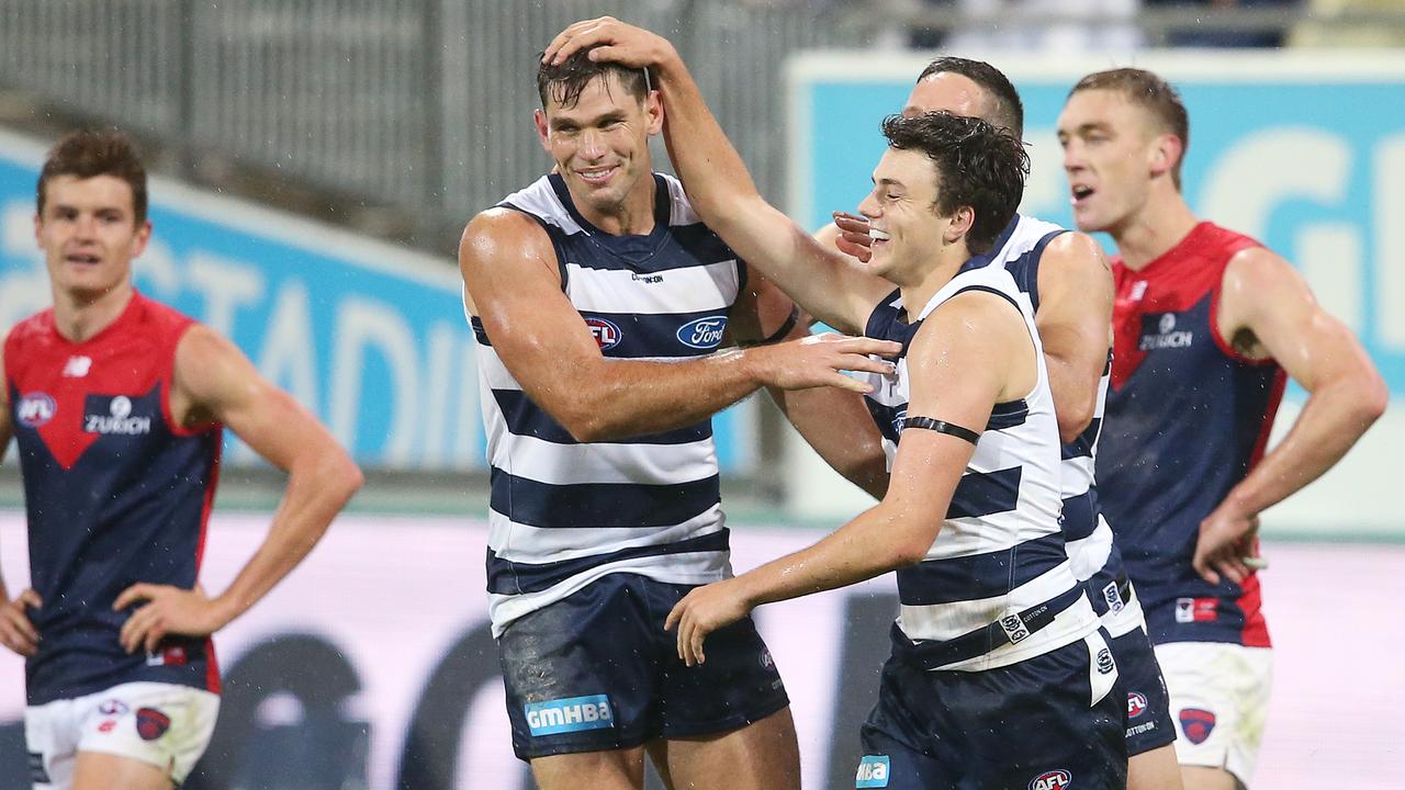 Jordan Clark celebrates a goal with Tom Hawkins on Saturday night.