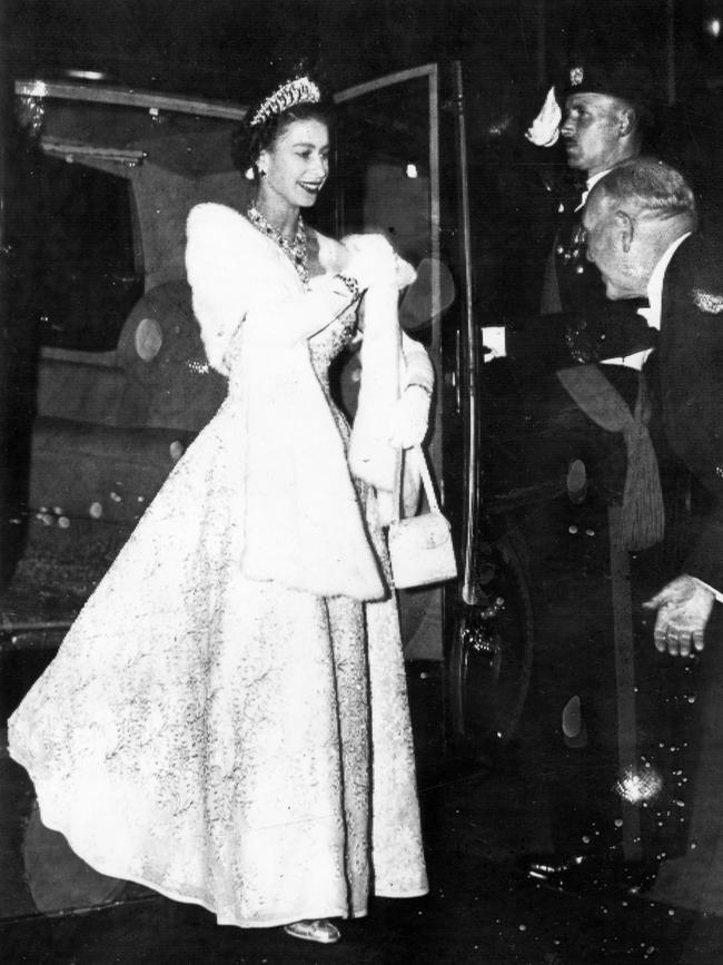 Queen Elizabeth II arrives at the Royal Command performance of The Tales of Hoffman at the Princess Theatre in Melbourne during the 1954 Royal tour.