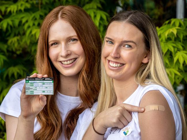 Imogen Clark and Izzy Tipper  - Two young women who brought their Pfizer dose forward to 3 weeks in a bid to get fully vaccinated quicker. Picture: Jake Nowakowski