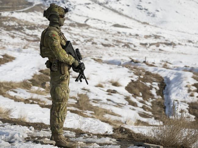 An Australian Army soldier from the Qargha Force Protection Company provides security during a tasking in Qargha, Kabul, Afghanistan. *** Local Caption *** Members of Force Protection Element 12 (FPE-12) are deployed to Camp Qargha, Kabul to provide protection to ADF and Coalition advisors conducting their train, advise and assist mission at the Afghan National Army Officer Academy (ANAOA).  FPE-12 Guardian Angels are Australian Regular Army and Army Reserve soldiers skilled in providing a secure and safe environment for advisors to conduct their work alongside their Afghan partners.  Australiaâs role at ANAOA is part of the ADFâs contribution to the NATO-led Resolute Support mission.  Around 300 ADF personnel are deployed to Afghanistan as part of Operation Highroad.