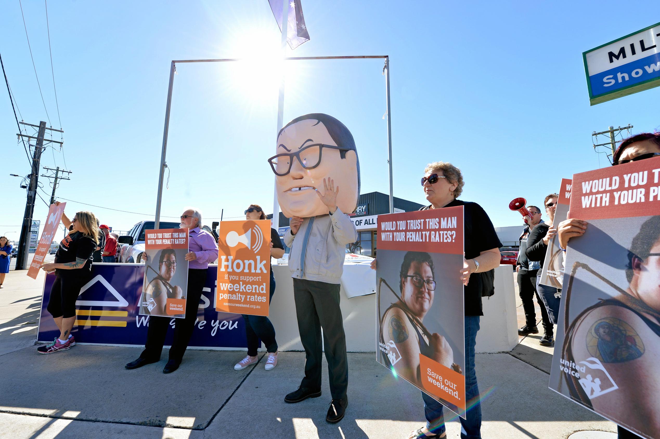 United Voice protesting for penalty rates at MP for Dawson George Christensen office in Mackay. Picture: Stuart Quinn
