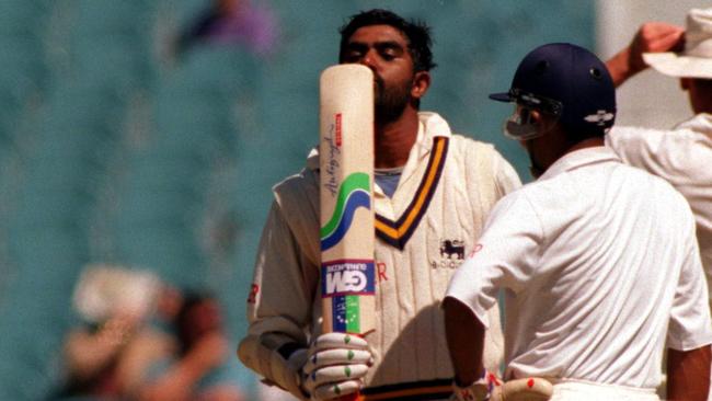 Asanka Gurusinha celebrates a century against Australia at the MCG.