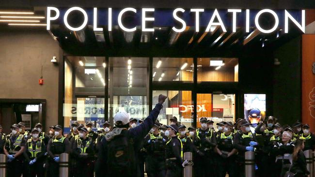 A protester outside the Bourke St police station during the Black Lives Matter protest in Melbourne in June.