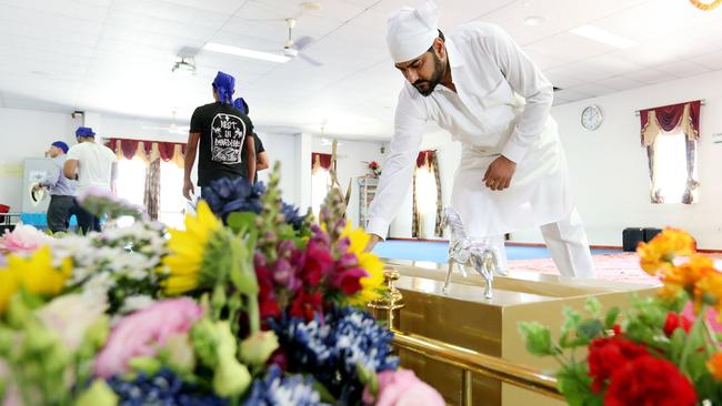 Hundreds of people paid respects at the temple. Pic: Tara Croser.