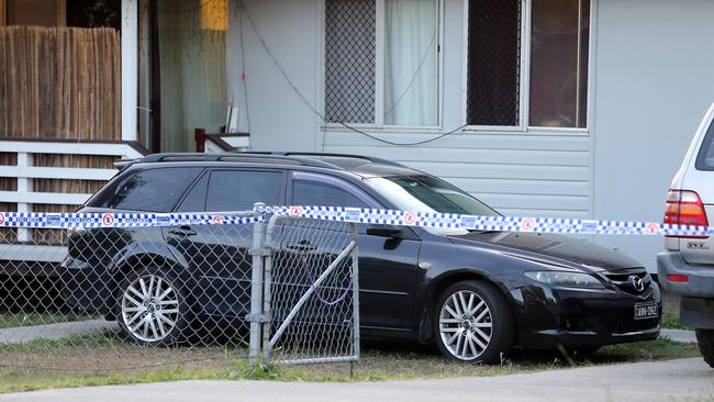 The house is now a crime scene. Photo: AAP Image/Richard Gosling