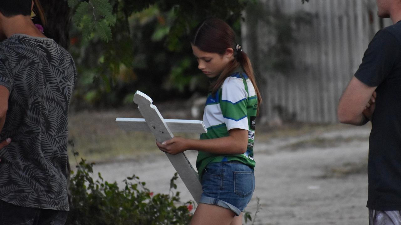 Friends and family of the late Bailey Pini gathered at the scene of Wednesday's fatal car crash in Bowen to install a memorial. Picture: Kirra Grimes