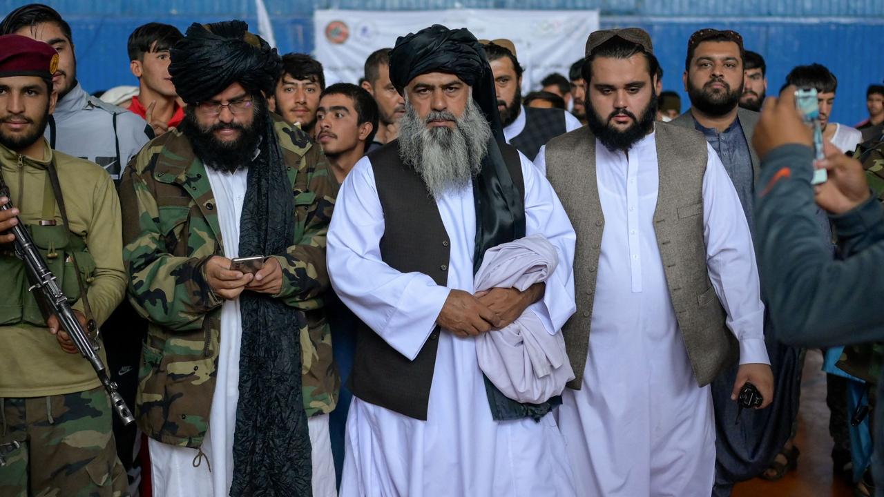 Taliban's director of physical education and sports Bashir Ahmad Rustamzai at a gymnastics event in Kabul. Photo by BULENT KILIC / AFP