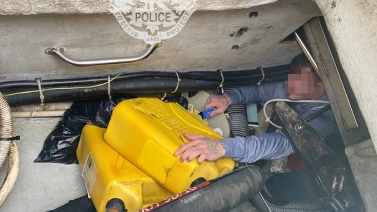 Police say fugitive Mark Horne found hiding inside hull of yacht. Picture: NTPFES