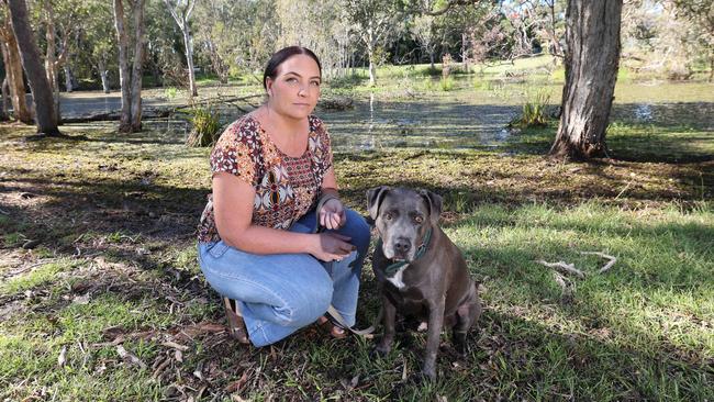 Lauren Quilligan and dog, Mick Jagger at the pond at Musgrave Park. Picture Glenn Hampson