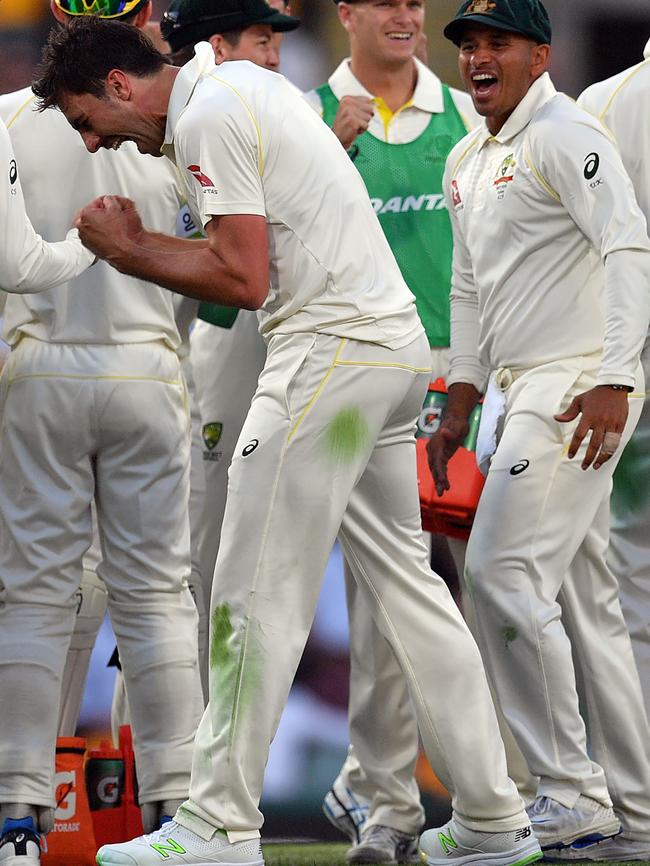 Pat Cummins celebrates the wicket of England captain Joe Root. Photo: AFP