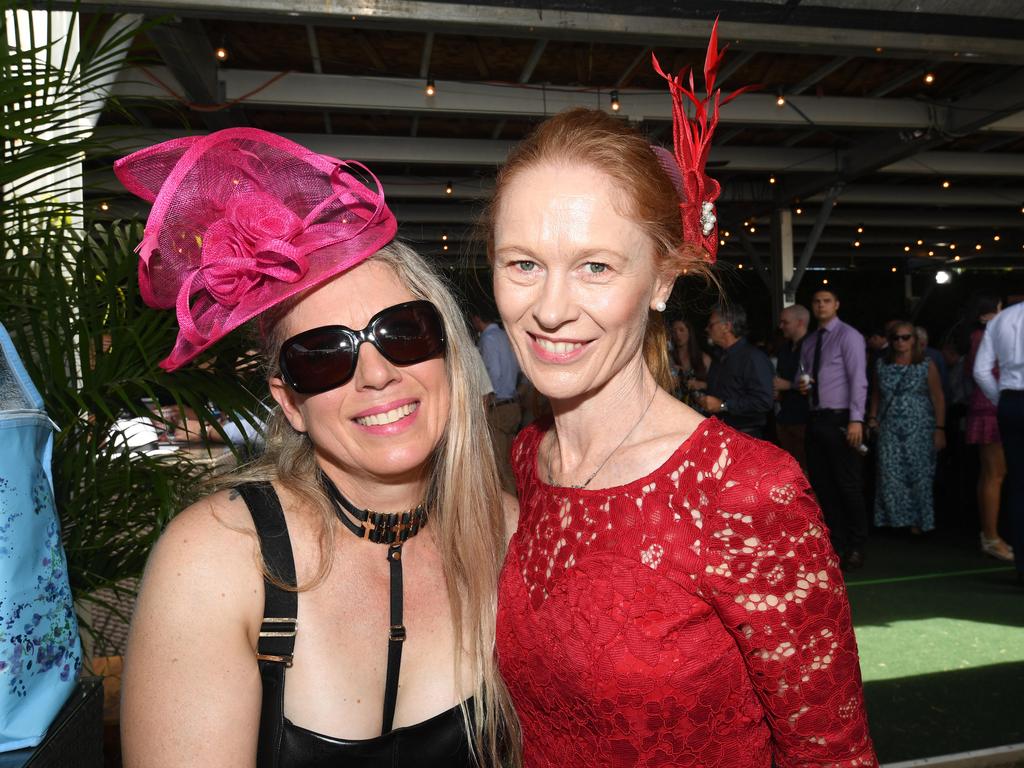 Kay Thorpe and Heather Docker enjoy the 2019 Darwin Cup. Picture: KATRINA BRIDGEFORD