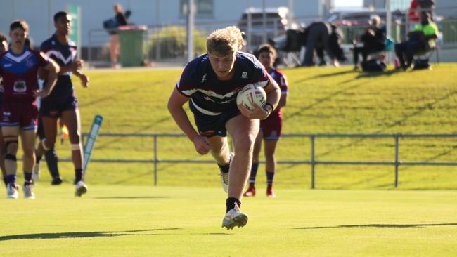 Tyler Theuerkauf scoring for Ipswich SHS earlier in the season.