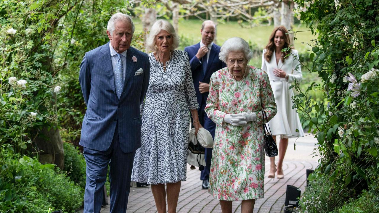 The Queen, resigned to her fate, wonders why she’s attending this boring chinwag when she could be watching Eastenders. Picture: Jack Hill/AFP