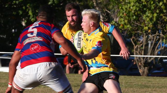 Round 12 2017 Gold Coast District Rugby Union match between Colleges Knights and Bond Pirates. Colleges Knights player No10 Sam Cox Bond Pirates player No5 Blake Martin. Picture Mike Batterham