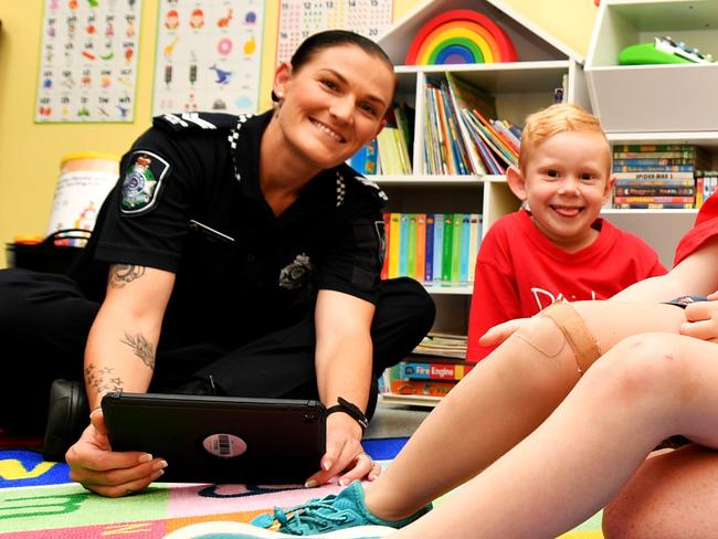 Townsville Police opening up a special room for kids at the Townsville City Police Station. SNR CON Jodie Petersen with Brett 5, Will 4 and Zac Stephenson 11. Picture: Alix Sweeney