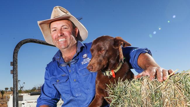 Drought - Longreach Queensland.Longreach grazier Dominic Burden and hos dog Ollie on the drought-declared property Macsland.Property is 20km north of Longreach.Picture: NIGEL HALLETT