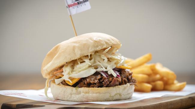 Devils Kitchen’s Korean Pulled Pork burger is a classic burger with a Korean twist. Picture: Chris Kidd