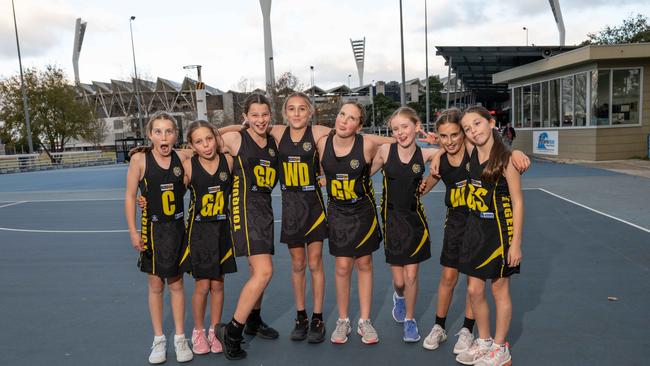 Torquay Hodge under-11 netball team pull their funniest faces.