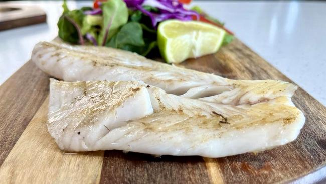 Coral trout and salad served at Wild Local seafood supplier and gourmet fish-and-chip restaurant in at 52 Herbert St, the Bruce Highway, in the Ingham CBD. Picture: Cameron Bates