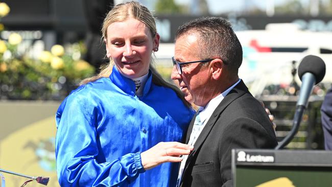 Kah with Darren Holland, the father of Dean Holland. Picture: Vince Caligiuri/Getty Images