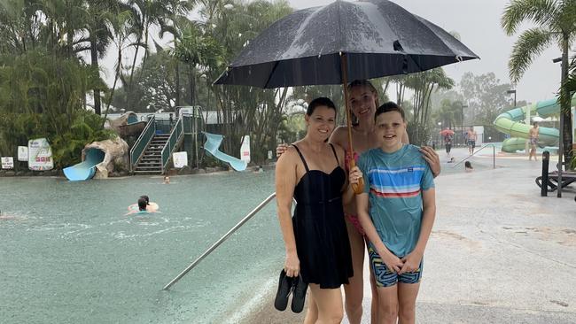 Cairns mother of three Tanya Snelling with her daughter Leah, 16 and son Jesse, 11 at Big4 Adventure Whitsunday caravan park during the deluge. Picture: Tanya Snelling