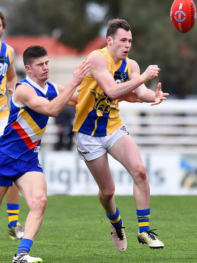 Daniel Venables fires out a handball for Western Jets. Picture: Josie Hayden.