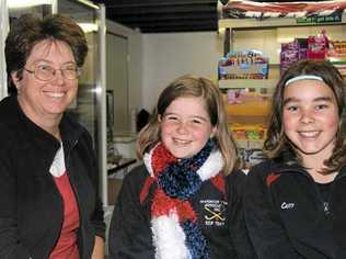 Julie See, Kaycie Gillam and Caitlin Schnitzerling have been working hard to keep the players’, supporters’ and officials’ bellies full at the Queens Park Canteen. Picture: Erin Smith