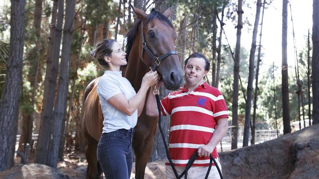 Former Melbourne Cup winning jockey Michelle Payne with brother Stevie Payne and horse Alhambra Lad that will run in the 2024 Hobart Cup. Picture: Nikki Davis-Jones