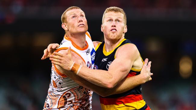 Reilly O'Brien battles it out with former Crows ruckman Sam Jacobs last year. Picture: Daniel Kalisz/Getty Images