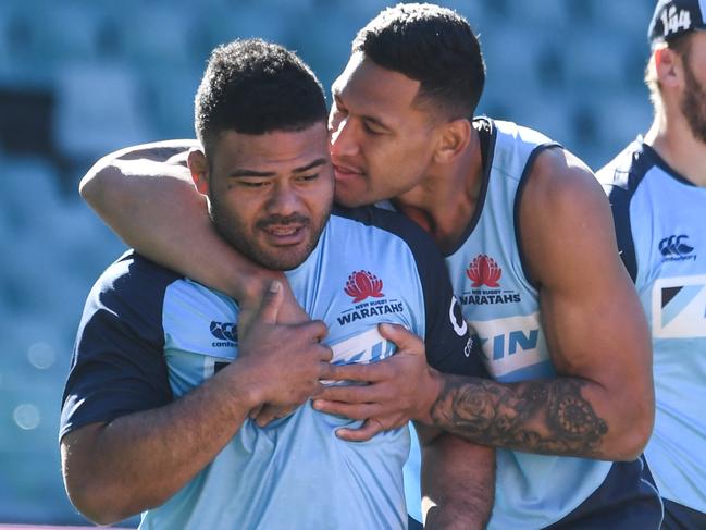 Former Waratahs teammates (L-R) Tolu Latu and Israel Folau. Picture: AAP Image/Peter Rae