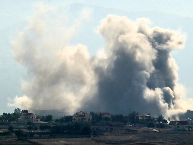 TOPSHOT - Smoke rises from the site of an Israeli airstrike that targeted the southern Lebanese village of Khiam on October 12, 2024. (Photo by Rabih DAHER / AFP)