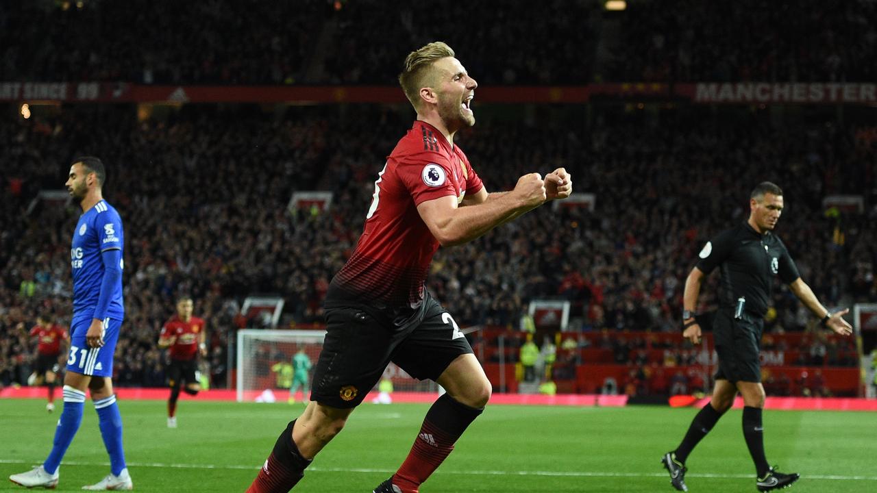 Manchester United's English defender Luke Shaw celebrates scoring the team's second goal