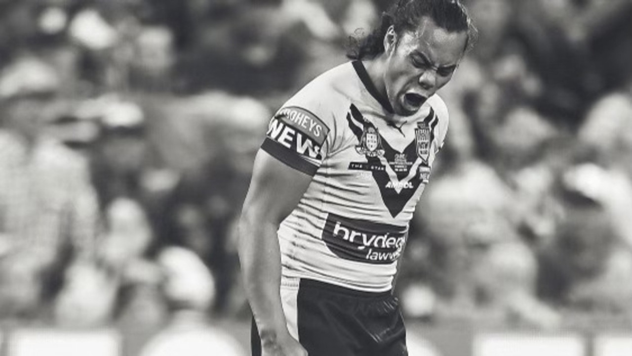 Jarome Luai gives it to Felise Kaufusi during Origin I in Townsville.