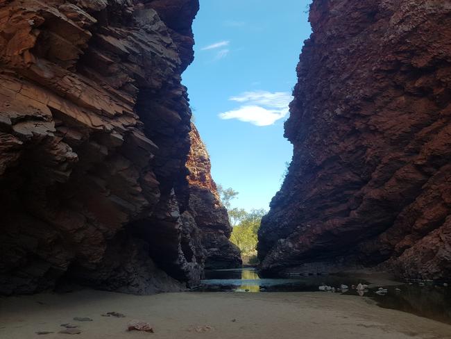 The stunning Simpson's Gap is west of Alice Springs in the MacDonnell Ranges and is popular spot for tourists to go bushwalking. 