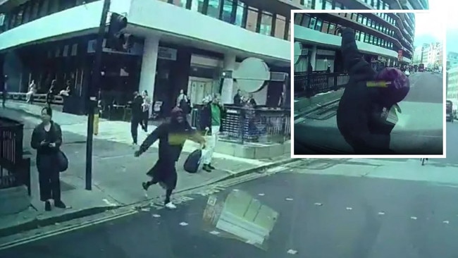 A shameless idiot jumps in front of a car in an apparent cash-for-crash scam. Picture: X