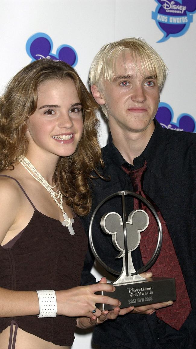 Emma Watson And Tom Felton in 2003. Photo by Brian Rasic/Getty Images