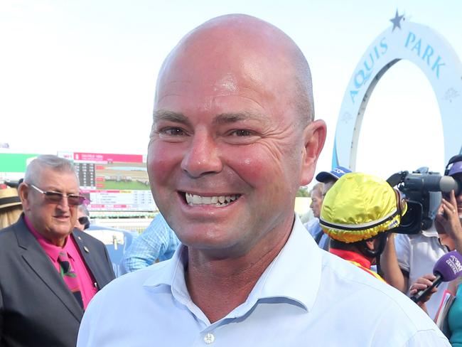 Gold Coast Turf Club race meeting, featuring two major lead in races to the Magic Millions.Photo of race 7. Photo of winner number 9 SNOW VALLEY. Jockey is Robbie Fradd, trainer is Matthew Dunn (pictured).Photo by Richard Gosling