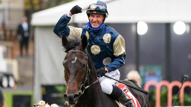 Glen Boss returns to the mounting yard on Sir Dragonet after winning the Cox Plate.