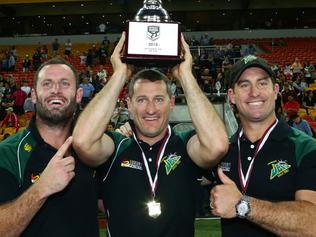 Chris Walker and his brothers, Jets coaches Ben and Shane Walker celebrates winning the Intrust Super Cup Grand Final between the Townsville Blackhawks and the Ipswich Jets. Pic Darren England.