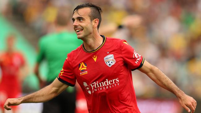 Adelaide’s Nikola Mileusnic celebrates a goal against Central Coast Mariners. Picture: Getty Images